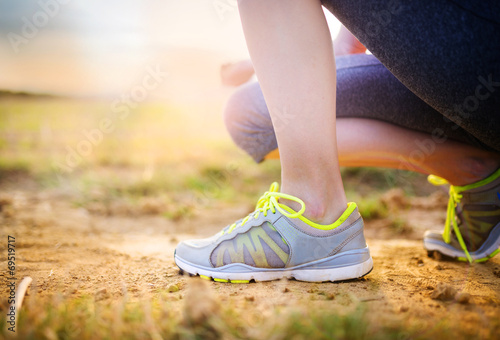 Woman running feet closeup