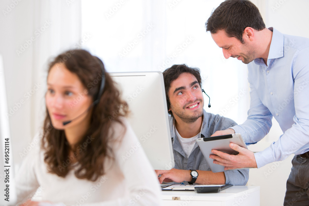 Manager training young attractive people Manager training young attractive people