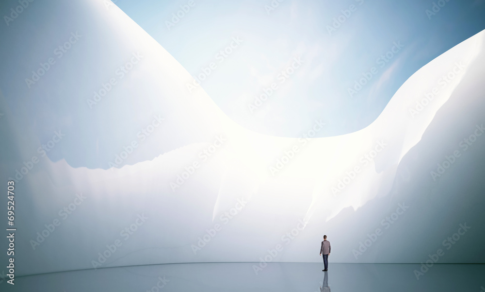 business man on a abstract architectural background business man on a abstract architectural background