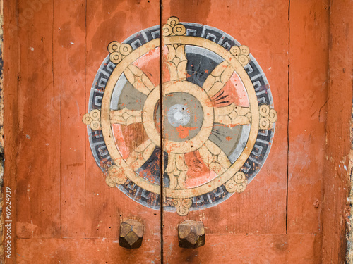 Wooden door on temple in Bhutan