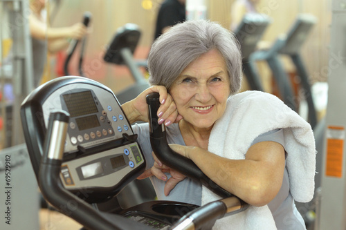 Senior woman exercising in gym