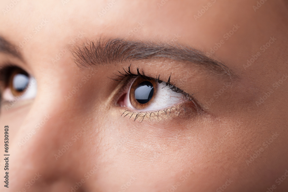 Obraz premium Portrait of a pretty girl close up eye