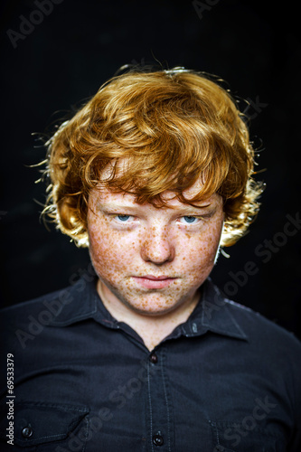 Obraz na płótnie Fat freckled boy portrait