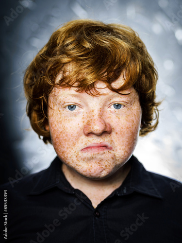 Obraz na płótnie Fat freckled boy portrait