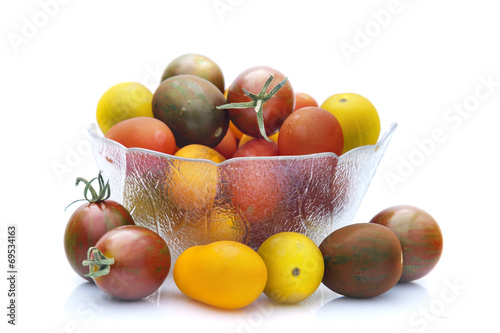 Assorted cherry tomatoes isolated on white