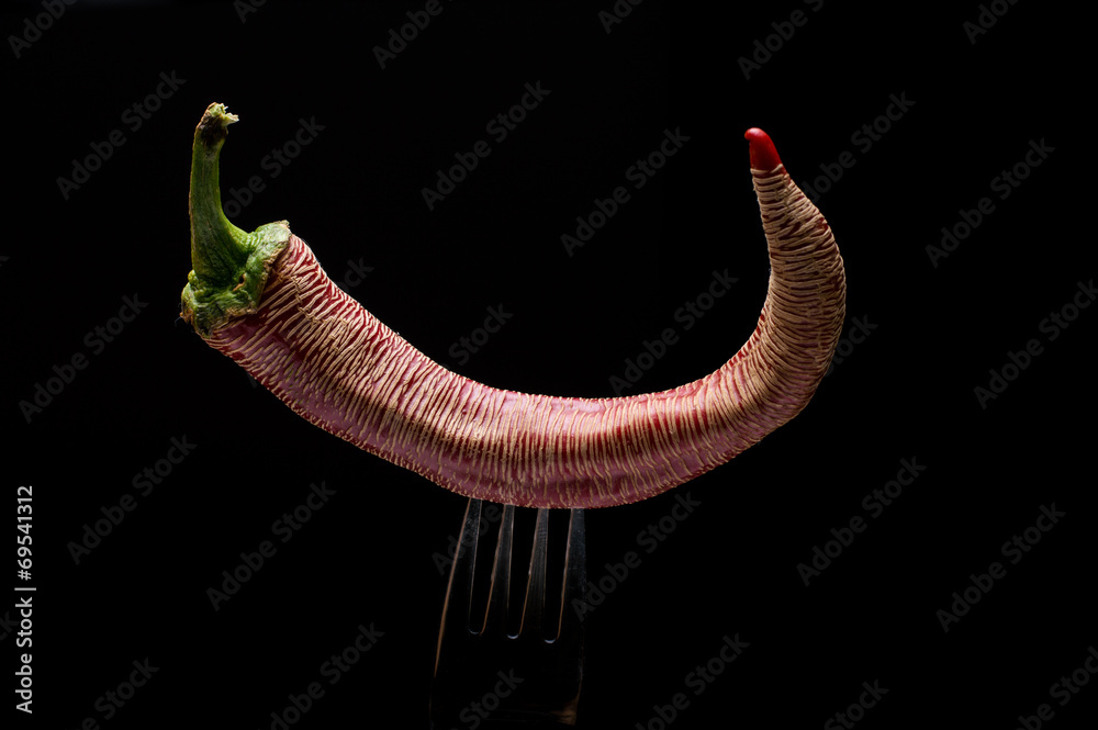 Naklejka premium Red Paprika Pepper On A Fork