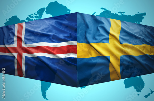 Waving Icelandic and Swedish flags photo