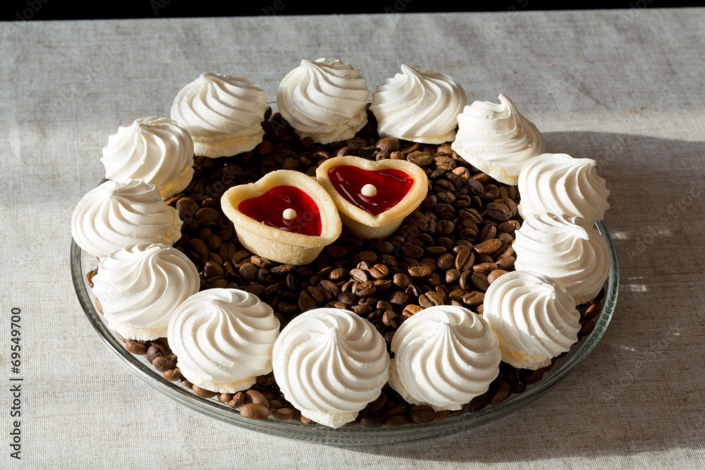 French vanilla meringue cookies and two sweet hearts