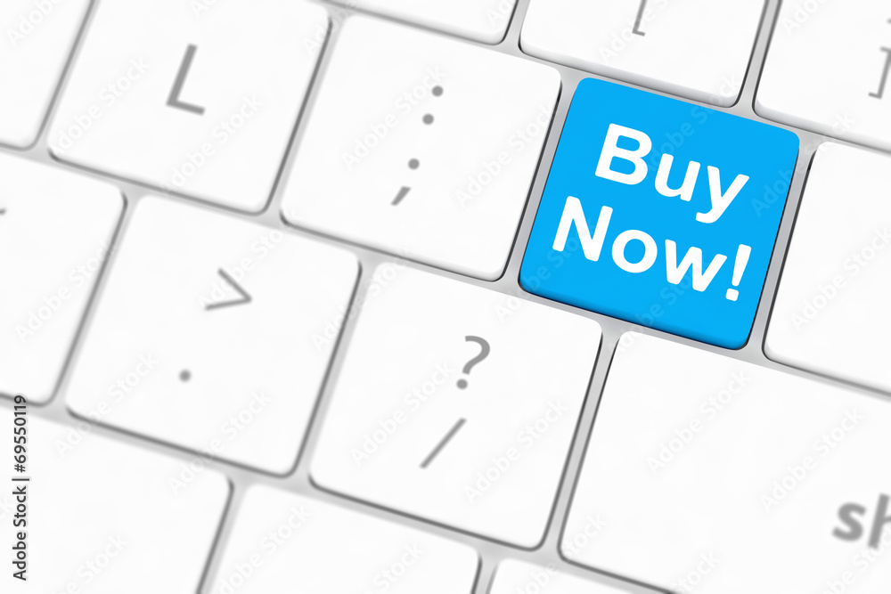 Buy now key on a white keyboard Buy now key on a white keyboard