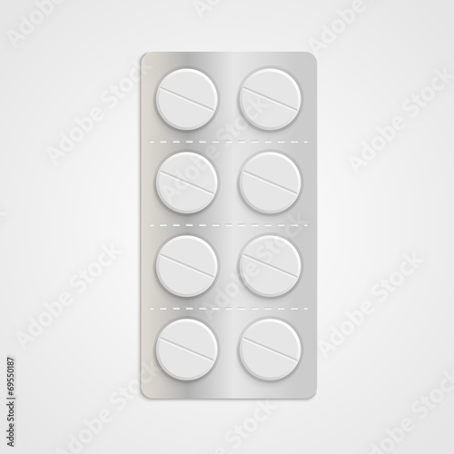 White realistic medical pills in blister pack.