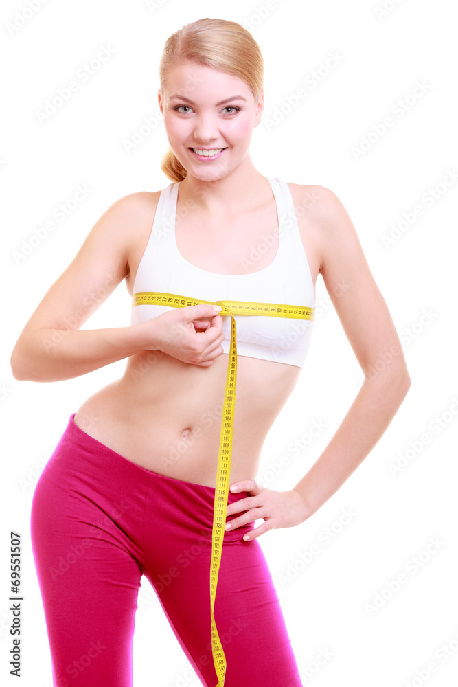 Fitness woman fit girl with measure tape measuring her bust Fitness woman fit girl with measure tape measuring her bust