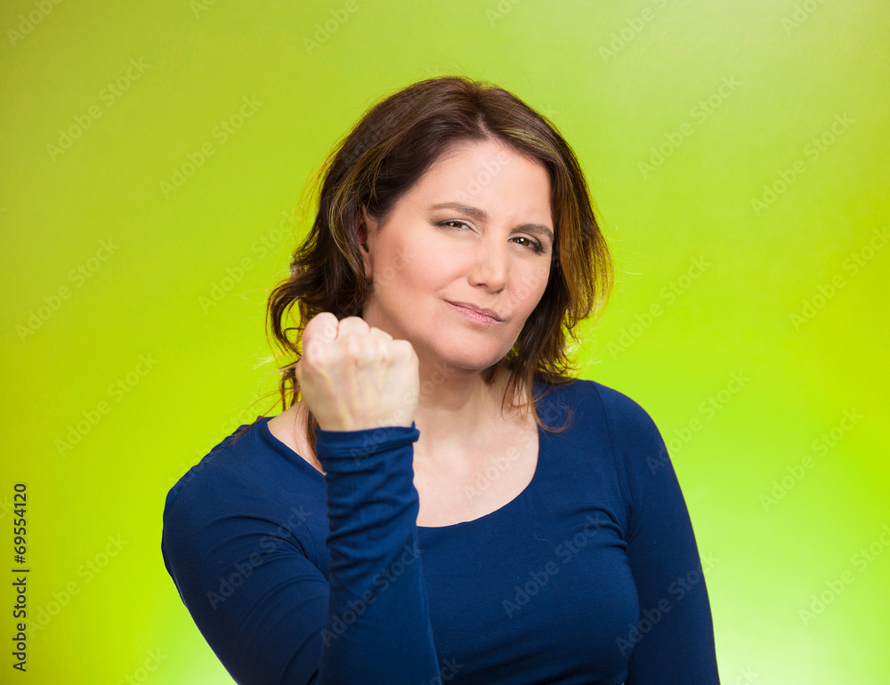 Woman worker, business employee showing fist, pissed off Woman worker, business employee showing fist, pissed off