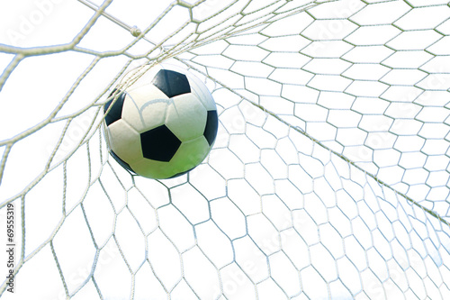 Fototapeta Naklejka Na Ścianę i Meble -  soccer ball in goal with blue