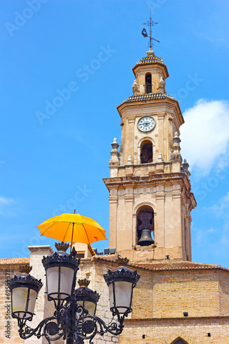Clock and Bells Tower with umbrella decoration © avmedved