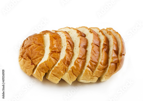 The cut loaf of bread slice isolated on white background