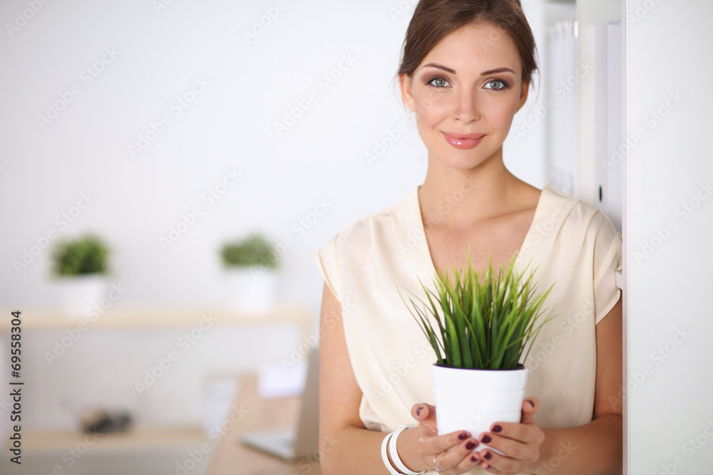 Closeup Of Businesspeople Hand Holding GrassTogether Closeup Of Businesspeople Hand Holding GrassTogether