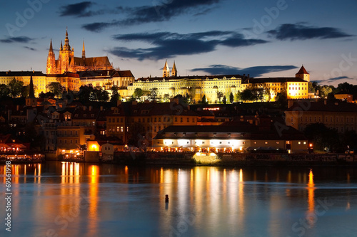 Old town of Prague as seen over river Vltava. © milangonda