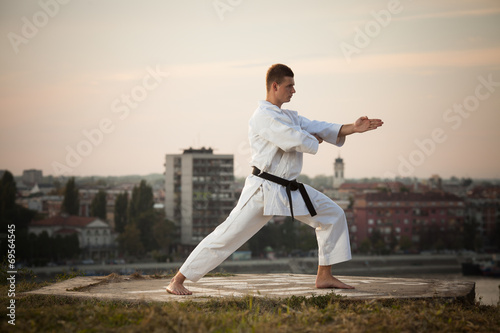 Man practicing martial arts outdoors