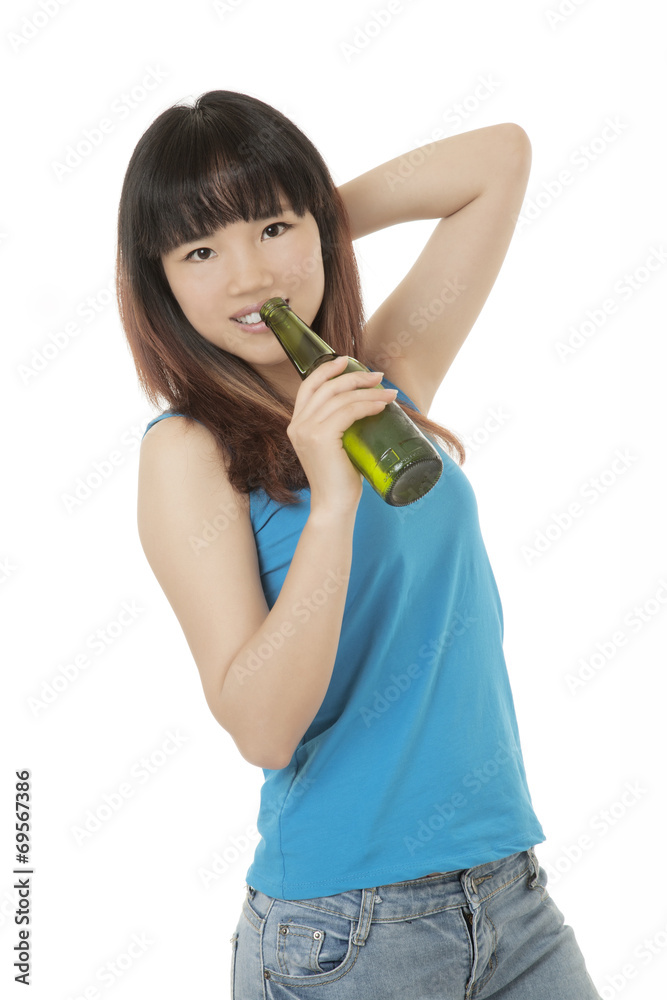 Asian woman enjoying a beer isolated on white Asian woman enjoying a beer isolated on white