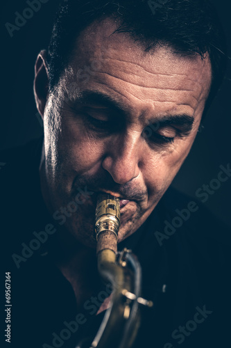 Canvas Print musician with saxophone