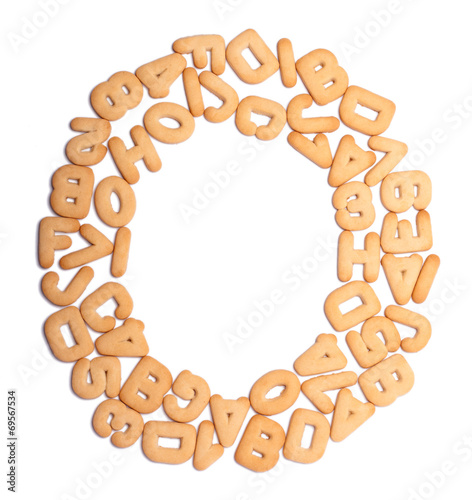 Round frame made of cookies in shape of letters and numbers