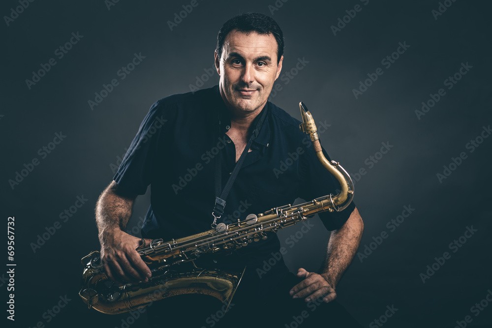 Naklejka premium musician with saxophone