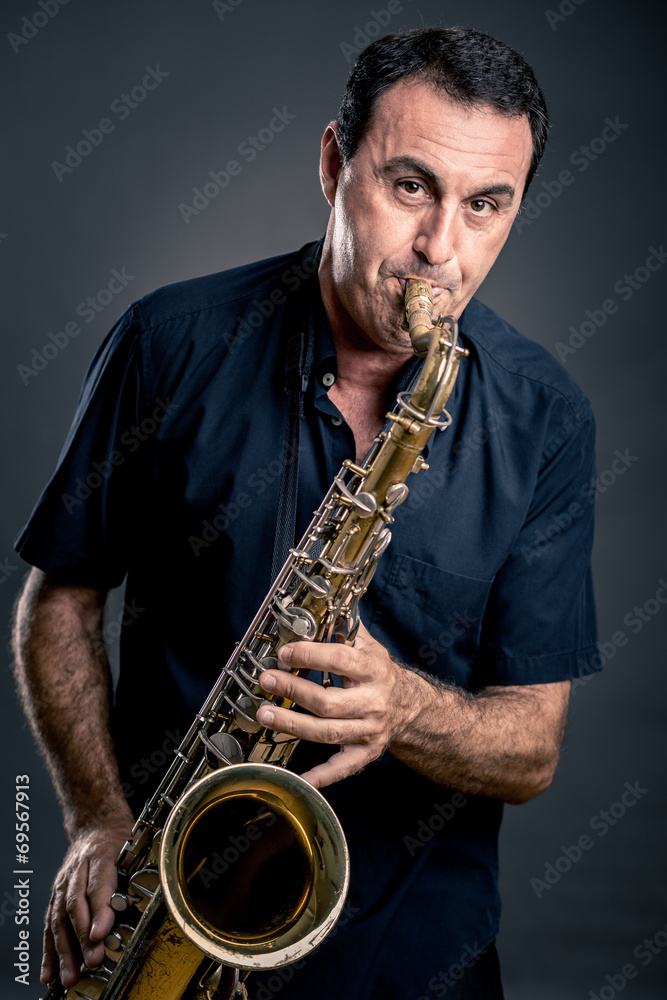 Fototapeta premium musician with saxophone
