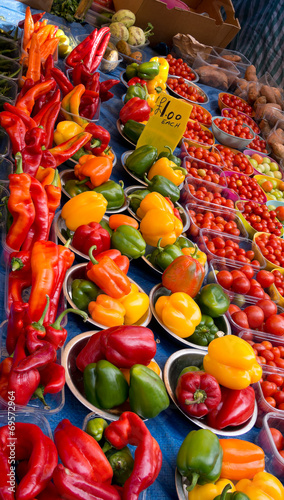 Market stall, London, UK. Fresh vegetables - peppers, tomatoes,