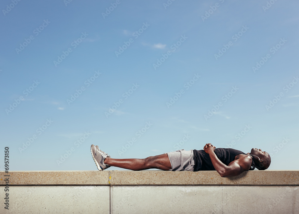 Fototapeta premium African man relaxing after his workout