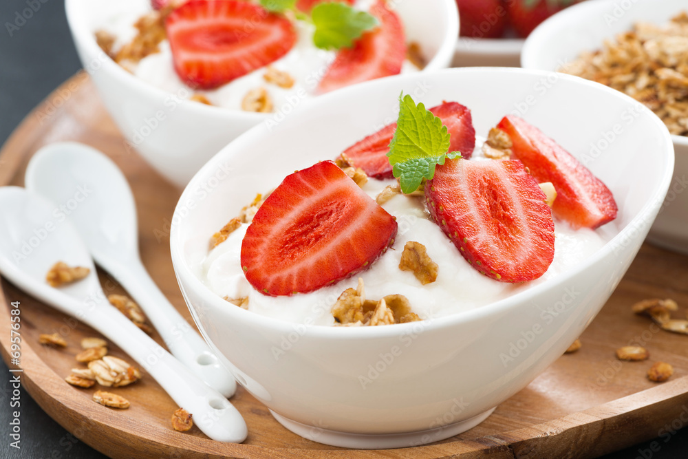 healthy breakfast - yogurt with fresh strawberries, granola healthy breakfast - yogurt with fresh strawberries, granola