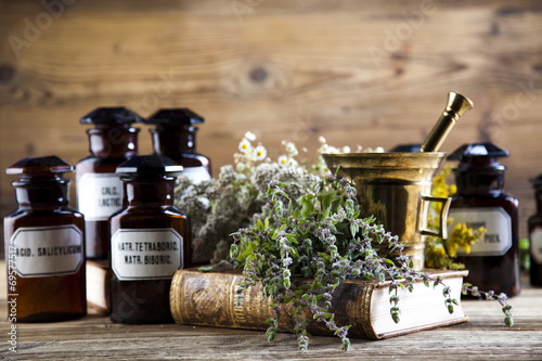 Medicine bottles and herbs 