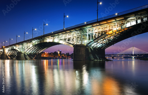 Two bridges illuminated in Warsaw #69578157
