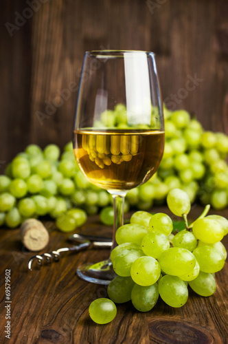 Wallpaper Mural White wine in a glass with vine and grapes Torontodigital.ca