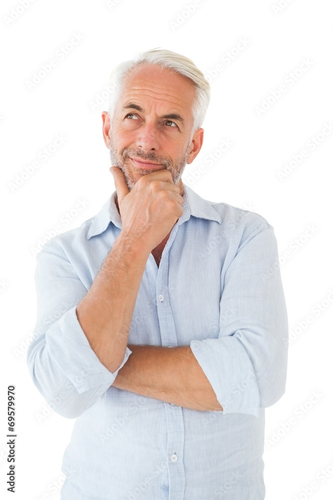 Thoughtful man posing with hand on chin Thoughtful man posing with hand on chin