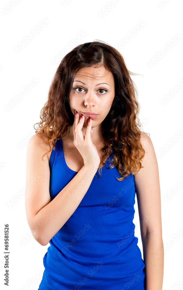 Beautiful young surprised woman looking at camera Beautiful young surprised woman looking at camera