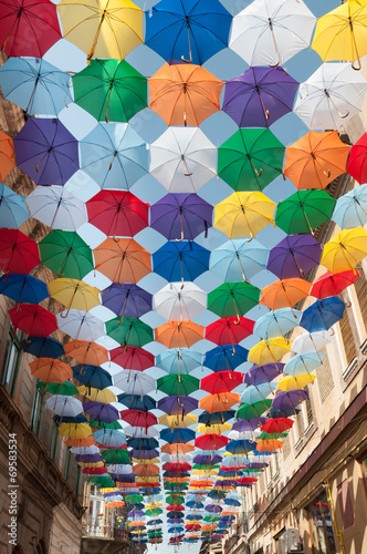 Street decorated with colored umbrellas