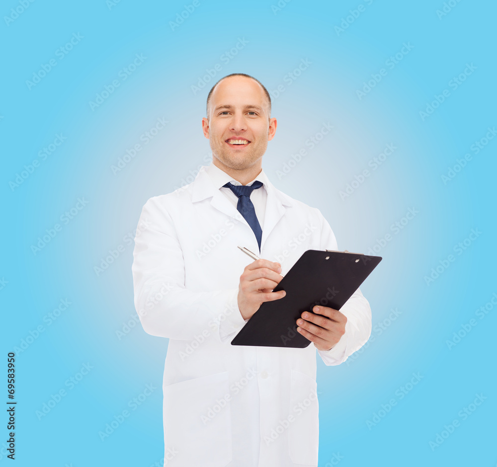 smiling male doctor with clipboard smiling male doctor with clipboard
