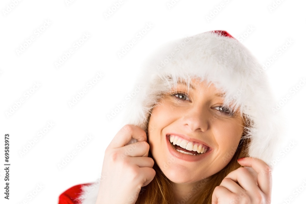 Festive redhead smiling at camera Festive redhead smiling at camera
