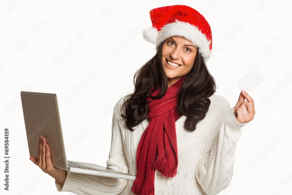 Woman holding a laptop computer Woman holding a laptop computer