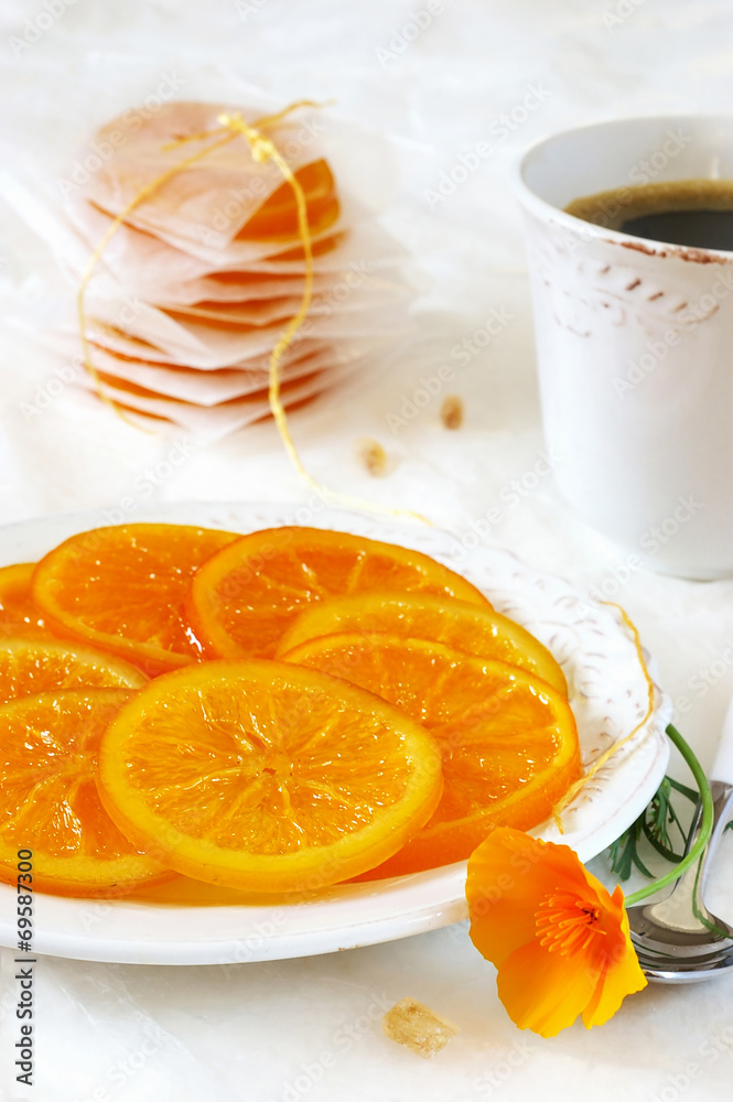 Candied fruits: slices of oranges and coffee Candied fruits: slices of oranges and coffee