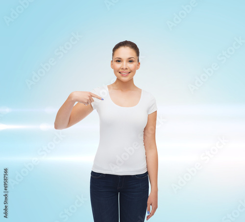 smiling young woman in blank white t-shirt