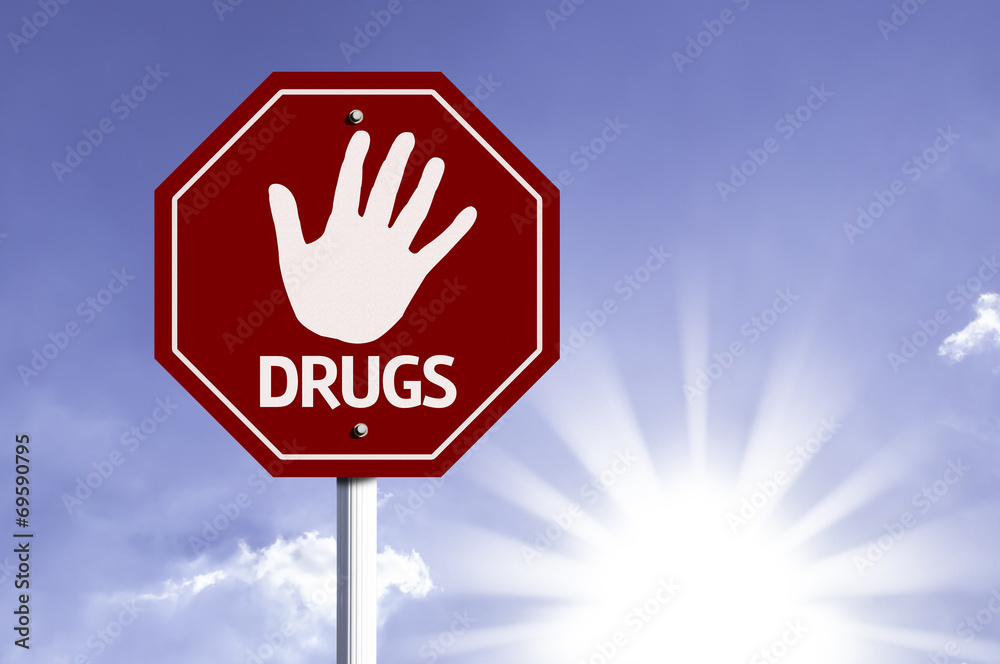 Stop Drugs red sign with sun background Stop Drugs red sign with sun background
