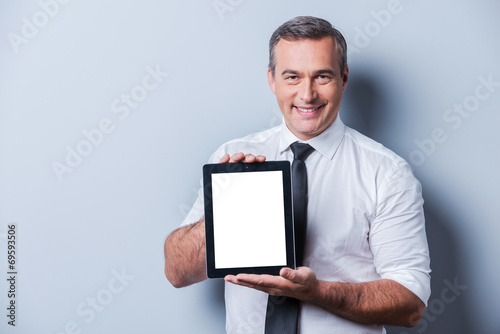 Copy space on his tablet.