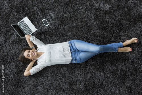 Young woman relaxing on the...