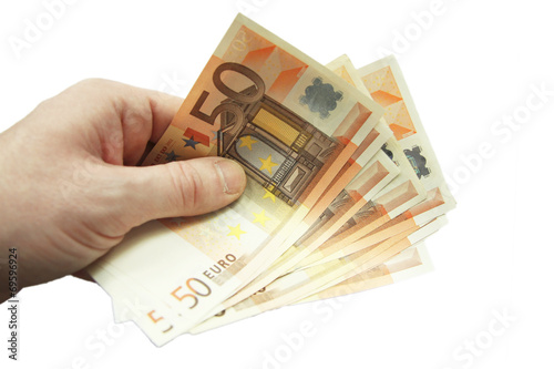 Stack of fifty euro banknotes isolated on the white background