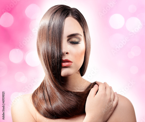 Beautiful young woman with ...