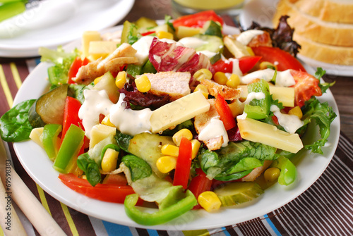 chicken salad with cheese and vegetables