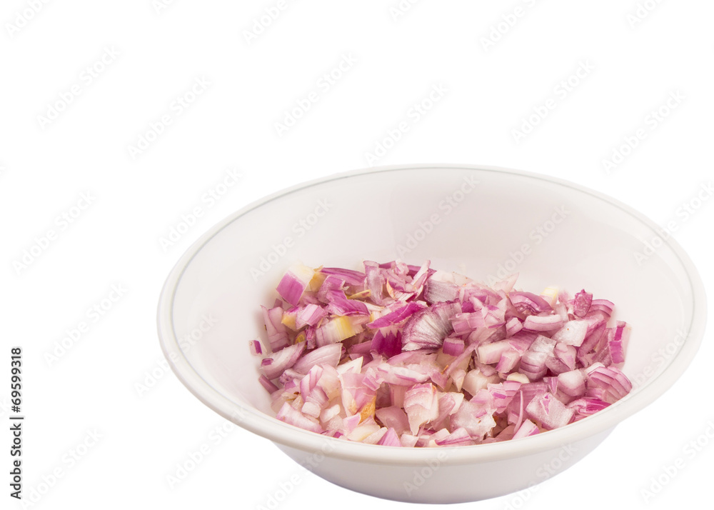 Chopped onions in a bowl over white background Chopped onions in a bowl over white background