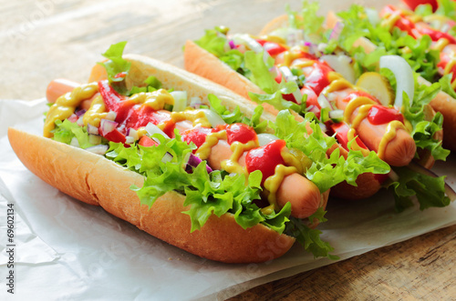 Hot dogs with fresh sausage and vegetables