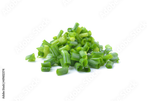 green onions on a white background